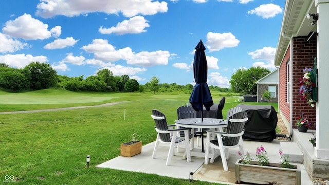 217 Saint Andrews Ave, Edinburgh, IN 46124 - view of patio featuring golf course view and a grill