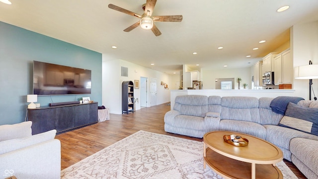 217 Saint Andrews Ave, Edinburgh, IN 46124 - living area featuring light wood-style floors, a ceiling fan, and recessed lighting