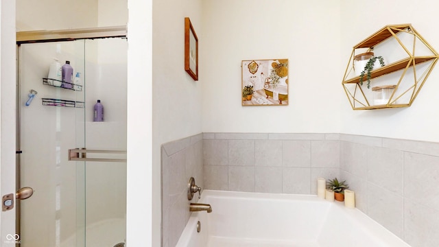 217 Saint Andrews Ave, Edinburgh, IN 46124 - full bath featuring a stall shower and a garden tub