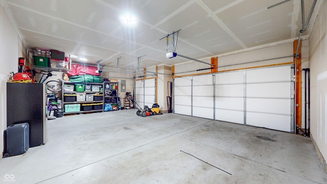 217 Saint Andrews Ave, Edinburgh, IN 46124 - garage featuring a garage door opener