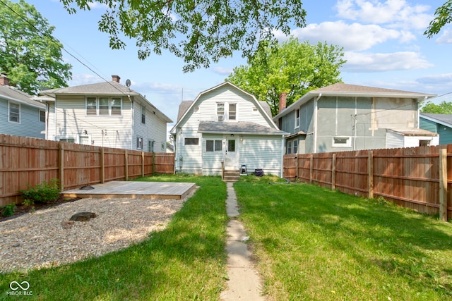 909 N Parker Ave, Indianapolis, IN 46201 - rear view of property featuring a gambrel roof, entry steps, and a deck