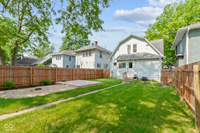 909 N Parker Ave, Indianapolis, IN 46201 - rear view of house with entry steps, a gambrel roof, and a patio area