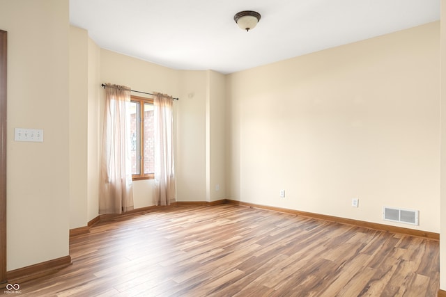 7082 Hunters Ridge Dr, Plainfield, IN 46168 - empty room with light wood-style flooring and baseboards