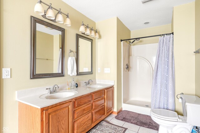 7082 Hunters Ridge Dr, Plainfield, IN 46168 - bathroom featuring double vanity, curtained shower, and tile patterned flooring