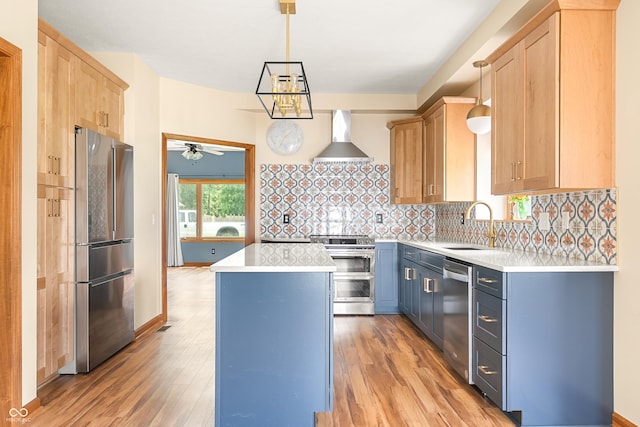 7082 Hunters Ridge Dr, Plainfield, IN 46168 - kitchen with appliances with stainless steel finishes, wall chimney exhaust hood, light countertops, and a center island