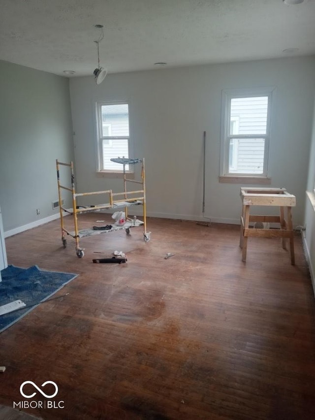 3626 N Denny St, Indianapolis, IN 46218 - empty room with wood finished floors and baseboards