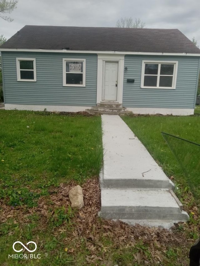 3626 N Denny St, Indianapolis, IN 46218 - single story home with roof with shingles and a front yard
