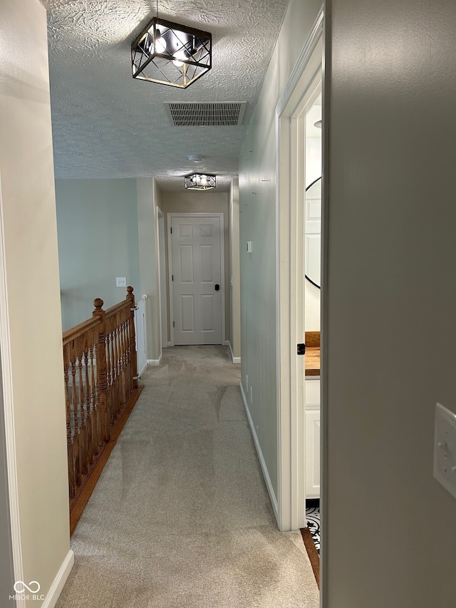7195 W 700 N, Fairland, IN 46126 - hall featuring a textured ceiling and light carpet