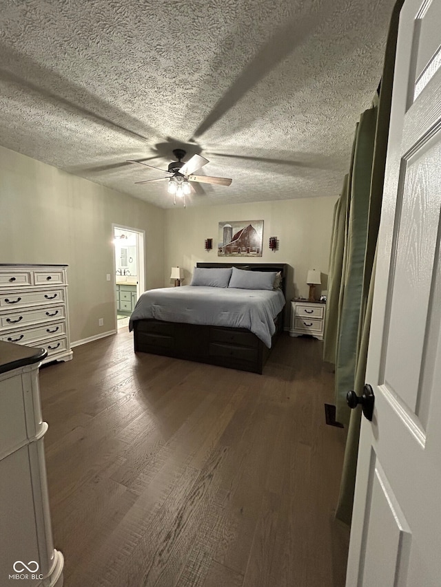 7195 W 700 N, Fairland, IN 46126 - bedroom featuring dark wood-style flooring, ceiling fan, and ensuite bath