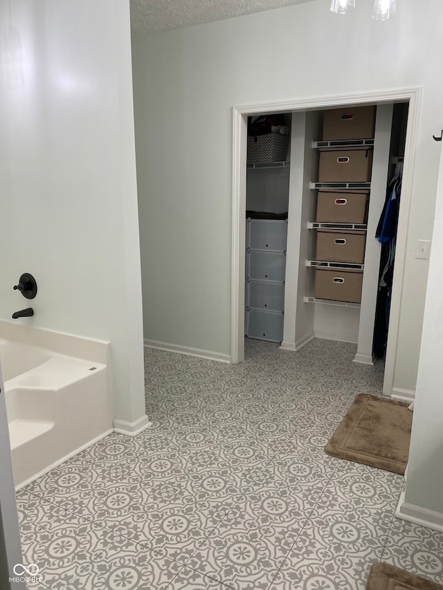 7195 W 700 N, Fairland, IN 46126 - full bathroom featuring a bath and a spacious closet