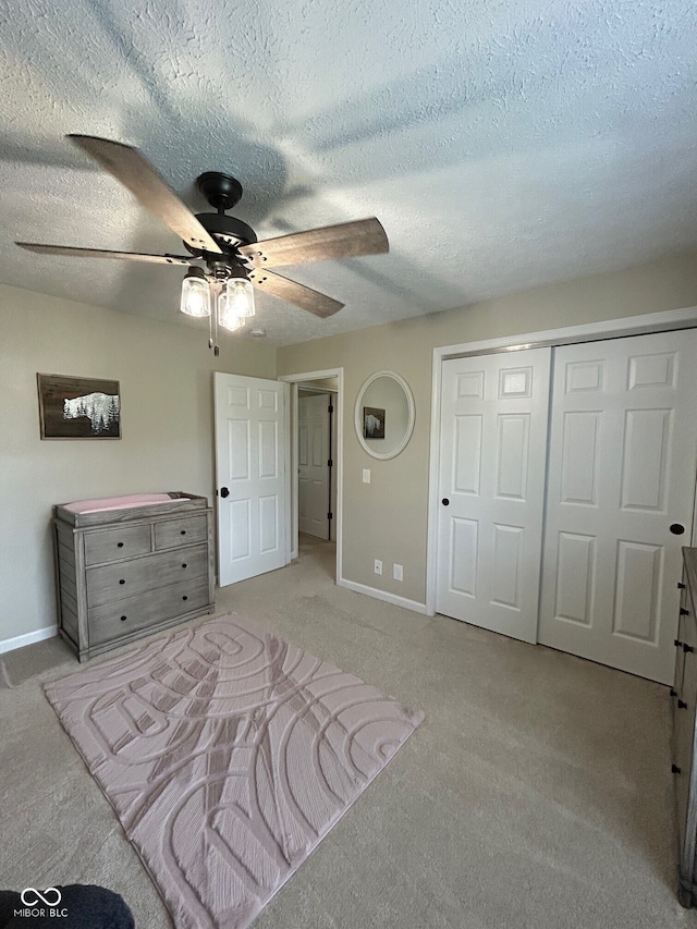 7195 W 700 N, Fairland, IN 46126 - carpeted bedroom with a closet, a textured ceiling, and ceiling fan