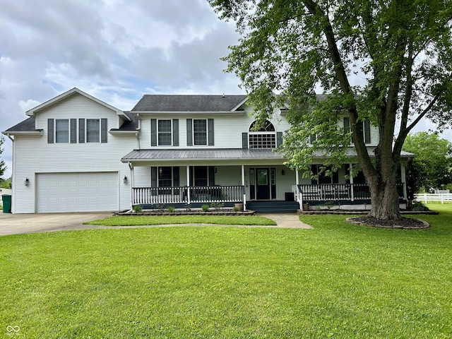 7195 W 700 N, Fairland, IN 46126 - view of front of home with a garage, covered porch, concrete driveway, and a front lawn