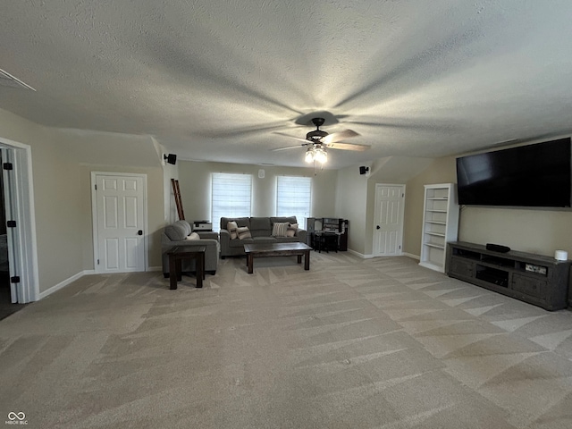7195 W 700 N, Fairland, IN 46126 - living area featuring a ceiling fan, light colored carpet, and a textured ceiling
