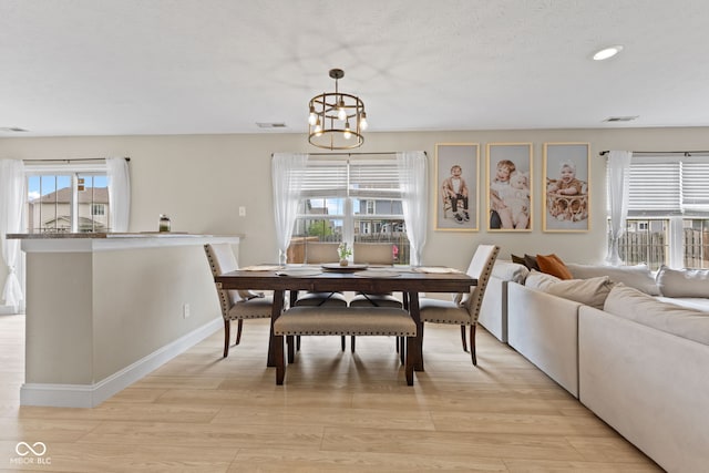 2580 Bluewood Way, Plainfield, IN 46168 - dining space featuring light wood-style flooring, recessed lighting, and a chandelier