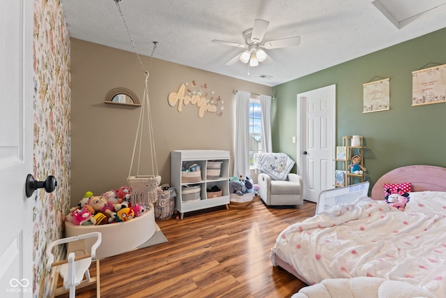 2580 Bluewood Way, Plainfield, IN 46168 - bedroom with wood finished floors, a textured ceiling, and ceiling fan