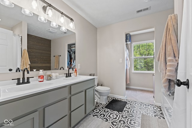 2580 Bluewood Way, Plainfield, IN 46168 - full bathroom featuring double vanity, tile patterned flooring, and a bathtub