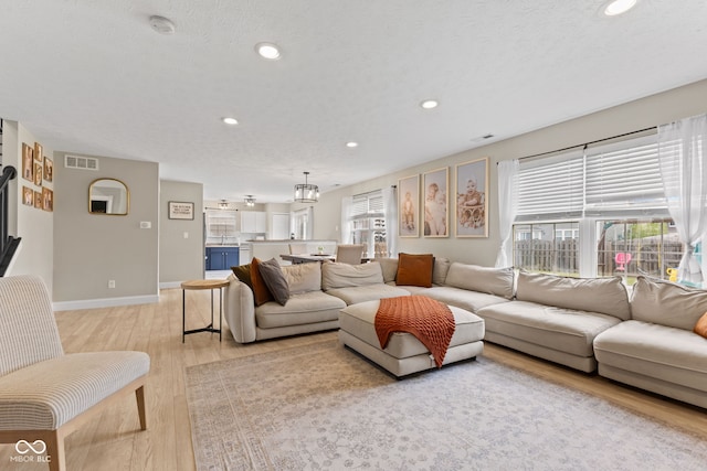 2580 Bluewood Way, Plainfield, IN 46168 - living room with recessed lighting and light wood-style floors