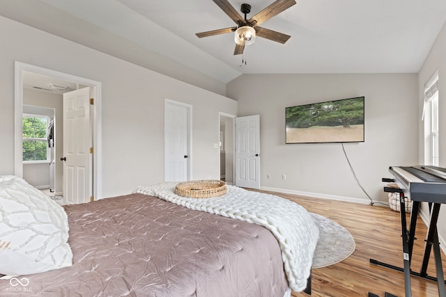 2580 Bluewood Way, Plainfield, IN 46168 - bedroom with wood finished floors and lofted ceiling