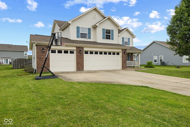2580 Bluewood Way, Plainfield, IN 46168 - view of front facade featuring brick siding, concrete driveway, an attached garage, and a front yard