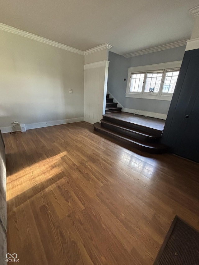 18 E Church St, Brazil, IN 47834 - stairway featuring wood finished floors, ornamental molding, and baseboards