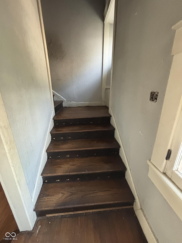 18 E Church St, Brazil, IN 47834 - stairs with wood finished floors and baseboards