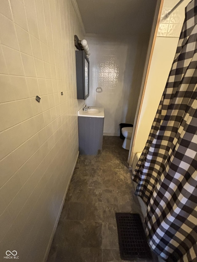 18 E Church St, Brazil, IN 47834 - full bath with toilet, tile walls, vanity, and ornamental molding