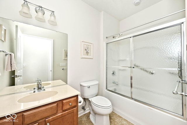 15937 Marsala Dr, Fishers, IN 46037 - bathroom with vanity, toilet, shower / bath combination with glass door, tile patterned flooring, and baseboards