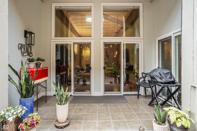 611 N Park Ave Unit 104, Indianapolis, IN 46204 - view of exterior entry with a patio area