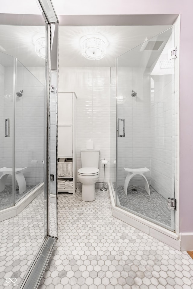 611 N Park Ave Unit 104, Indianapolis, IN 46204 - bathroom with toilet and a stall shower