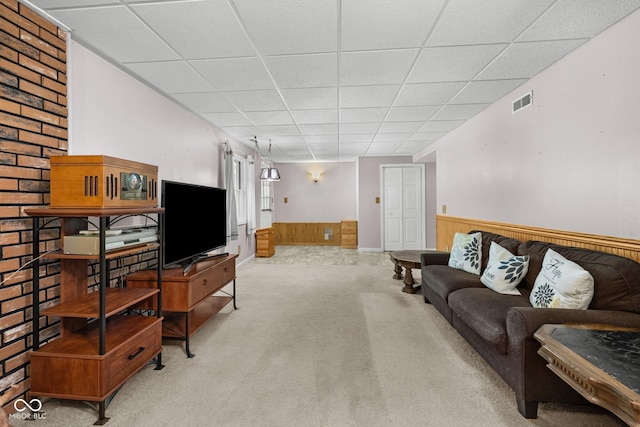 1350 Inverness Farms Rd, Martinsville, IN 46151 - carpeted living room with wainscoting, a paneled ceiling, and wood walls