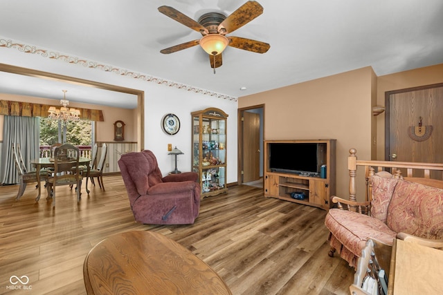 1350 Inverness Farms Rd, Martinsville, IN 46151 - living room with a chandelier, wood finished floors, and a ceiling fan