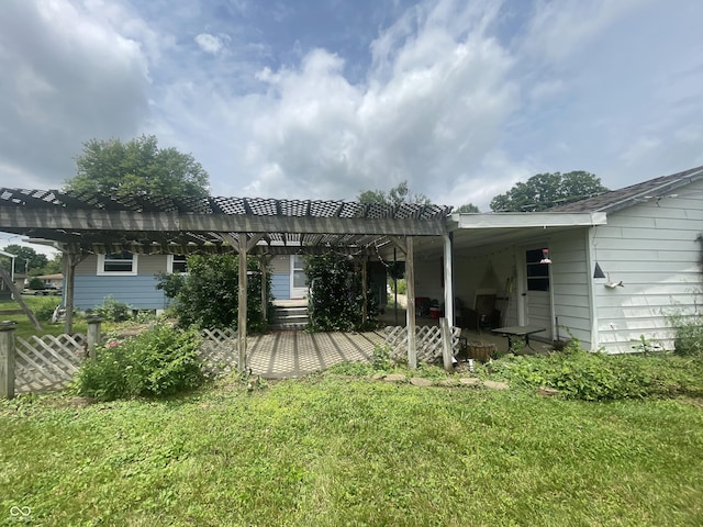 4363 Roosevelt Dr, Columbus, IN 47201 - back of property with a pergola and a yard