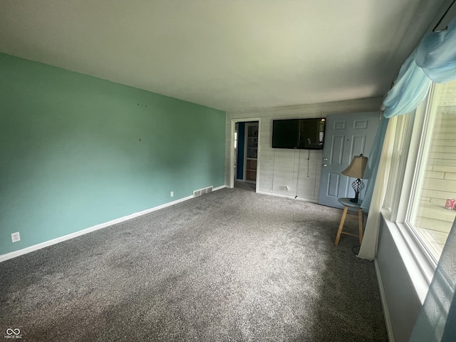4363 Roosevelt Dr, Columbus, IN 47201 - unfurnished living room featuring carpet flooring and baseboards