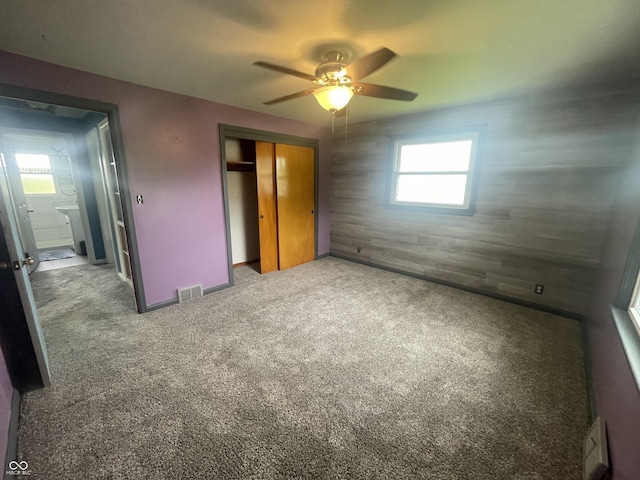 4363 Roosevelt Dr, Columbus, IN 47201 - unfurnished bedroom with a closet, carpet, and a ceiling fan