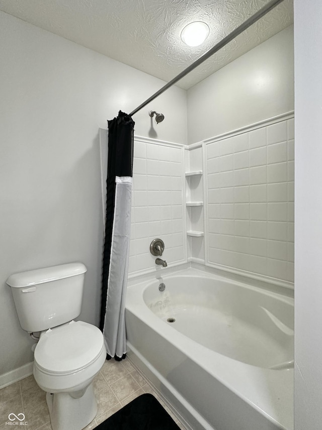 4925 Chip Shot Ln, Indianapolis, IN 46235 - full bath with toilet, shower / tub combo, tile patterned flooring, and a textured ceiling
