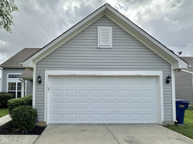 4925 Chip Shot Ln, Indianapolis, IN 46235 - garage with concrete driveway