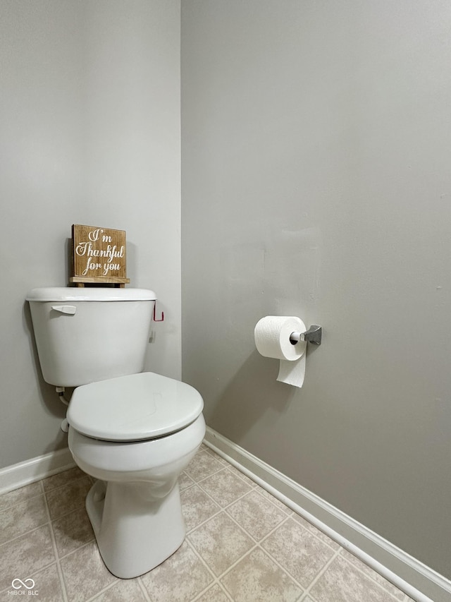 4925 Chip Shot Ln, Indianapolis, IN 46235 - bathroom featuring baseboards, tile patterned floors, and toilet