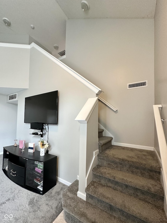 4925 Chip Shot Ln, Indianapolis, IN 46235 - staircase featuring carpet floors and baseboards