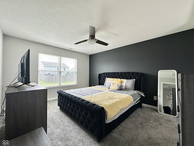 4925 Chip Shot Ln, Indianapolis, IN 46235 - bedroom with carpet flooring, a ceiling fan, baseboards, and a textured ceiling