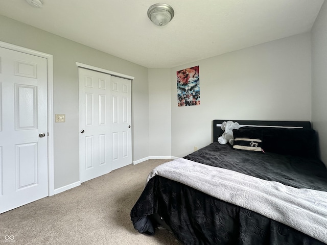 4925 Chip Shot Ln, Indianapolis, IN 46235 - bedroom featuring carpet floors, baseboards, and a closet