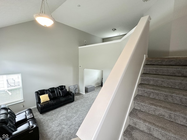 4925 Chip Shot Ln, Indianapolis, IN 46235 - staircase featuring carpet flooring and lofted ceiling