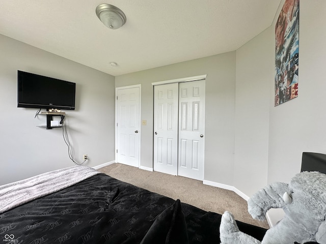 4925 Chip Shot Ln, Indianapolis, IN 46235 - carpeted bedroom with baseboards and a closet