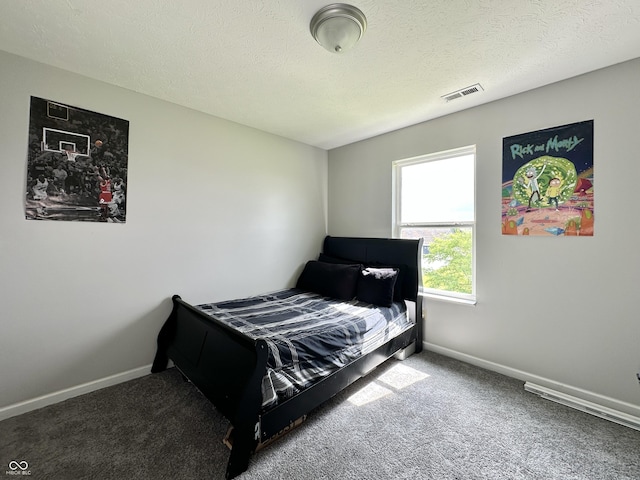 4925 Chip Shot Ln, Indianapolis, IN 46235 - bedroom featuring carpet, baseboards, and a textured ceiling