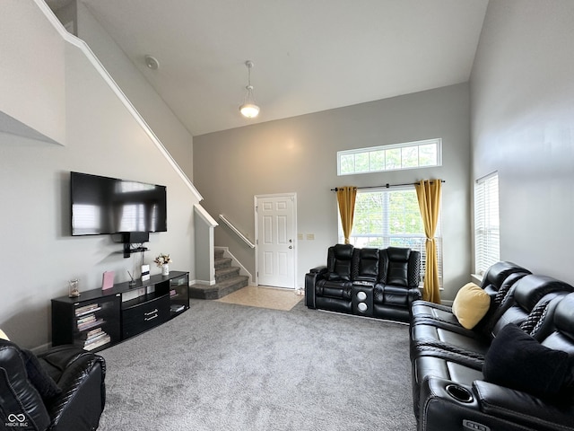 4925 Chip Shot Ln, Indianapolis, IN 46235 - carpeted living area with stairs and high vaulted ceiling