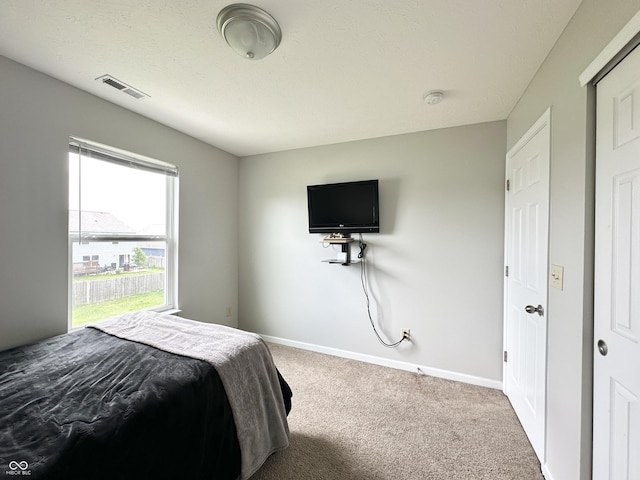 4925 Chip Shot Ln, Indianapolis, IN 46235 - bedroom with carpet floors and baseboards