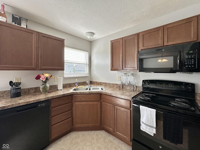 4925 Chip Shot Ln, Indianapolis, IN 46235 - kitchen with black appliances, a sink, brown cabinetry, a textured ceiling, and light flooring