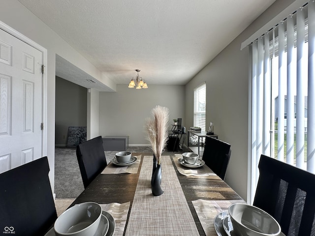 4925 Chip Shot Ln, Indianapolis, IN 46235 - dining room with a chandelier and a textured ceiling