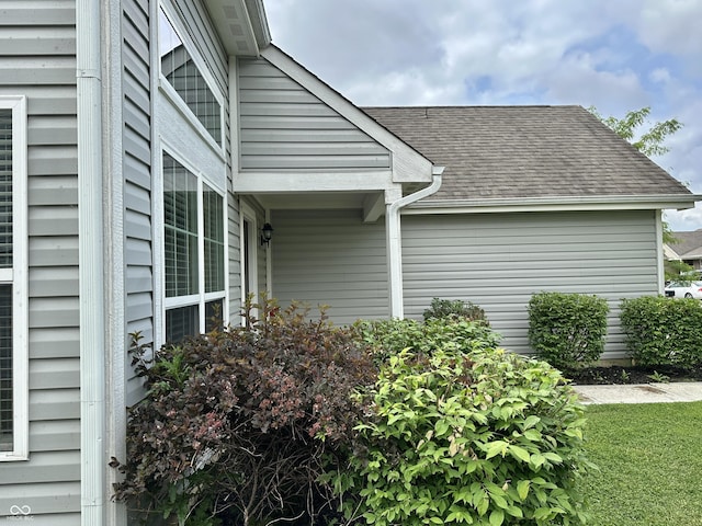 4925 Chip Shot Ln, Indianapolis, IN 46235 - view of property exterior featuring roof with shingles