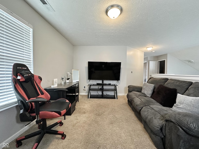 4925 Chip Shot Ln, Indianapolis, IN 46235 - carpeted living area with an office area, baseboards, and a textured ceiling