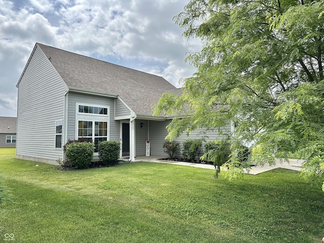 4925 Chip Shot Ln, Indianapolis, IN 46235 - view of front of house with roof with shingles and a front lawn